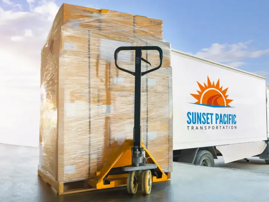 Pallets prepared to be loaded onto a Sunset Pacific Transportation truck.